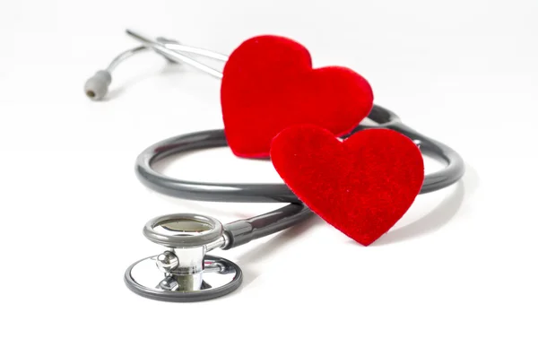 Stethoscope and red heartl on white background — Stock Photo, Image