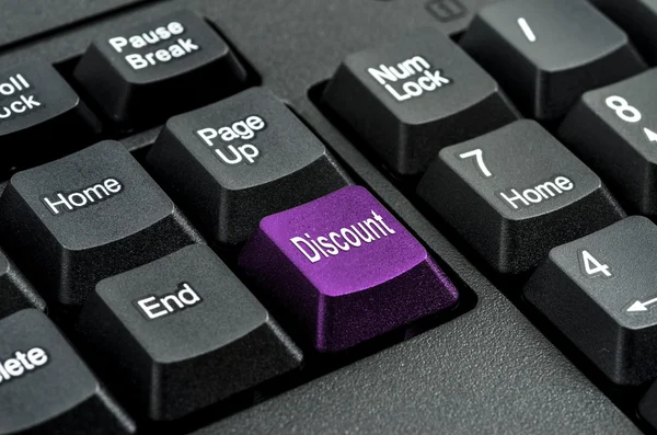 Keyboard with the word   discount   written on a button — Stock Photo, Image