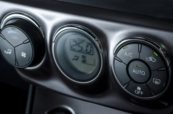 Color detail with the air conditioning button inside a car — Stock Photo, Image