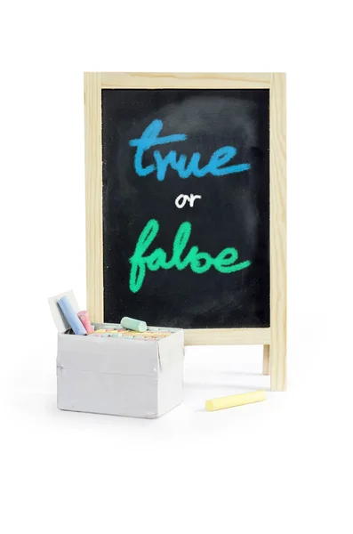 True or false with checkboxes - white chalk handwriting on blackboard Clipping path — стоковое фото