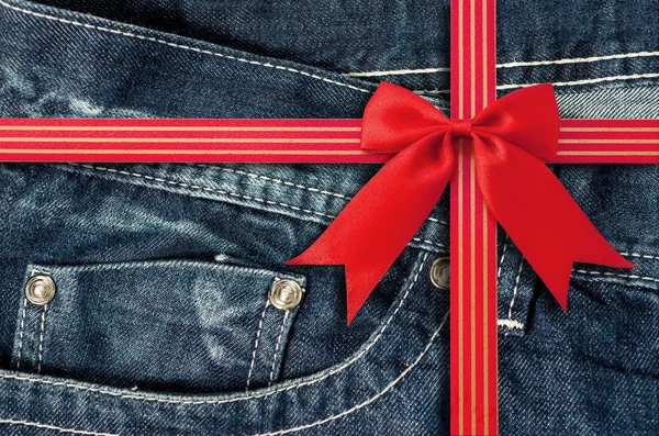 Denim Pocket Closeup with Red Bow — Stock Photo, Image