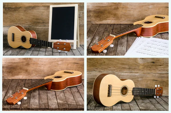 Collection of Ukulele and blackboard on wooden background — Stock Photo, Image