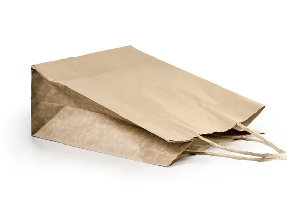 Καφέ χονδρό χαρτί τσάντα με αντίγραφο χώρο σε λευκό φόντο: διαδρομή αποκοπής — Φωτογραφία Αρχείου