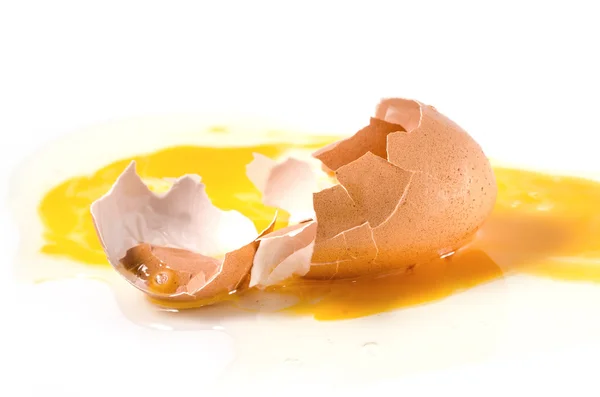 Crack egg on white background — Stock Photo, Image