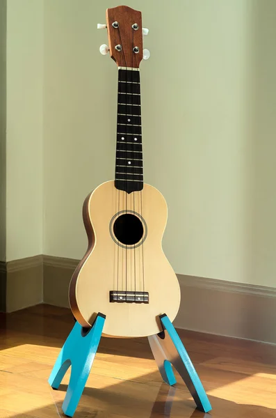 Ukulele and stand in my bedroom — Stock Photo, Image