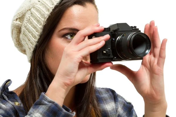 Young woman with brown hair holds camera — Stock Photo, Image