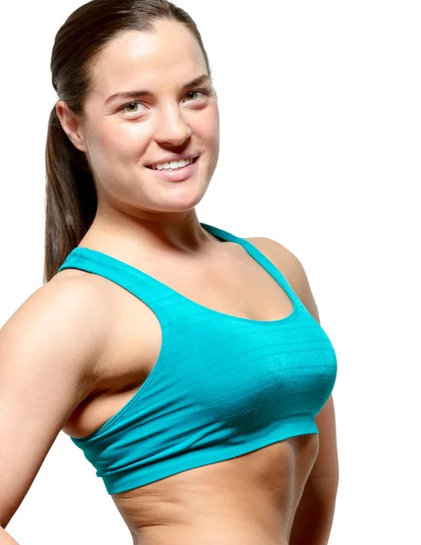 Jonge, sportieve vrouw toont haar gezonde figuur — Stockfoto