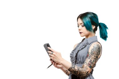 Young professional female with tattoos clipart