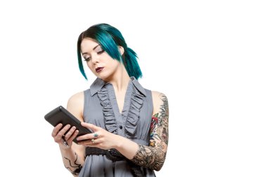 Young professional female with tattoos clipart