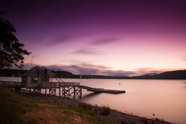 Dlouhá expozice fotografie krásný výhled na jezero te anau v čas západu slunce, Jižní ostrov, Nový Zéland — Stock fotografie