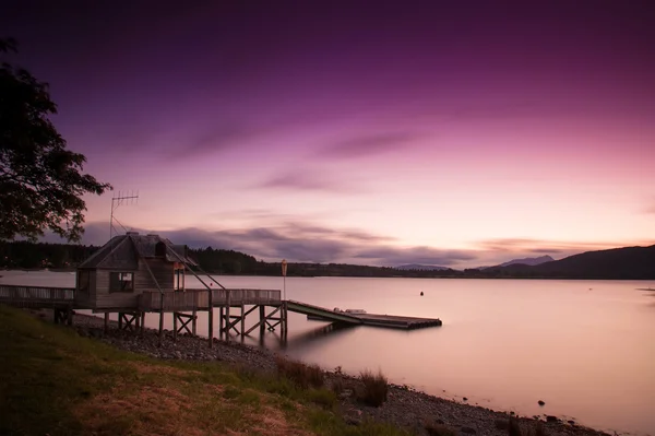 te anau günbatımı zamanı, south Island, Yeni Zelanda, gölde güzel görünümü uzun pozlama fotoğraf