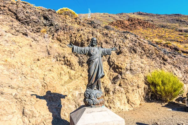 Standbeeld van Jezus aan de voet van mount teide — Stockfoto