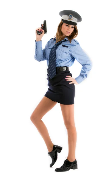Femme flic posant avec arme sur fond blanc — Photo