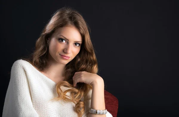 Portrait of a young lady on black background — Stock Photo, Image