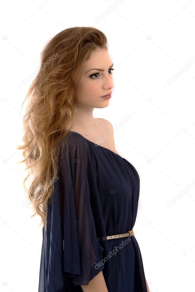 beautiful young woman with long hair posing on white background