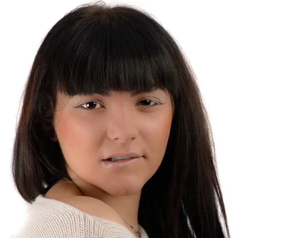 Portrait of a young brunette in studio on white background — Stock Photo, Image