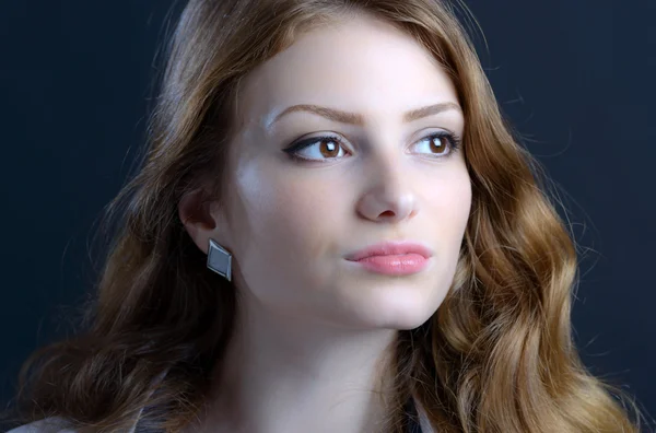 Portrait of a beautiful blonde young woman in studio — Stock Photo, Image