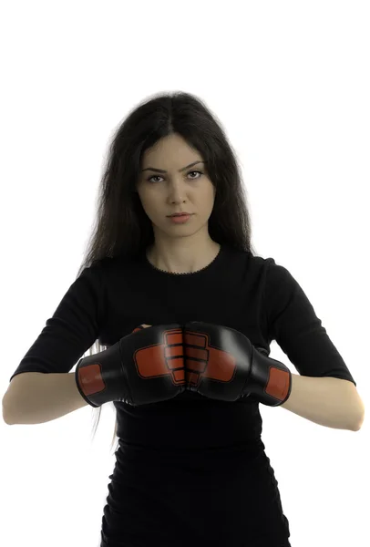 年轻的女孩，在黑色的背景与拳击手套 — 图库照片