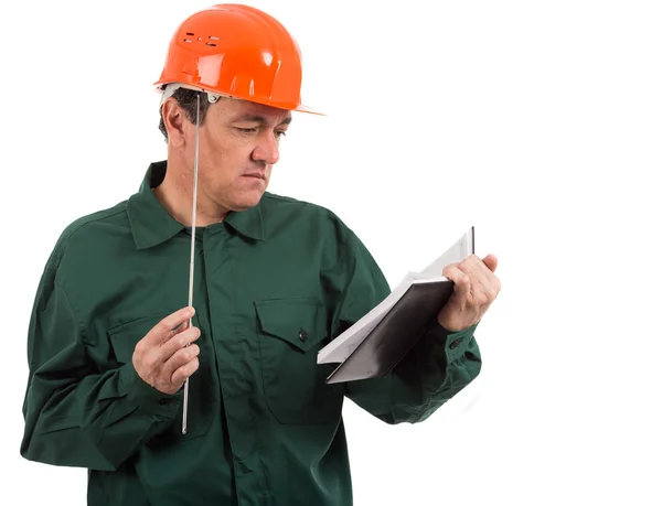 A worker thinking after looking at your notes — Stock Photo, Image