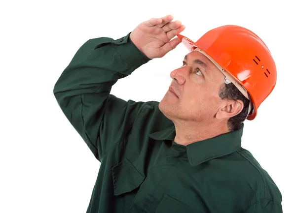 Vecchio elettricista in uniforme con lampadina. Isolato su bianco — Foto Stock