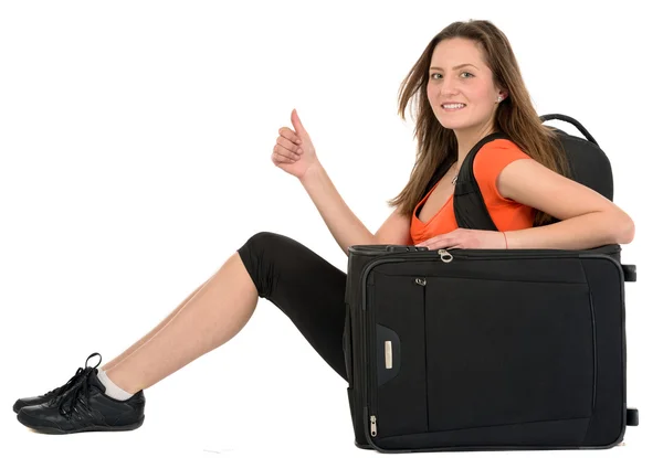 A beautiful woman tourist with luggage isolated on white backgro — Stock Photo, Image