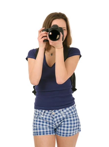 Turista feminino que tira fotos isoladas no fundo branco — Fotografia de Stock