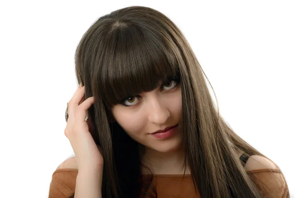 Una hermosa mujer con el pelo largo en el estudio aislado en bac blanco —  Fotos de Stock