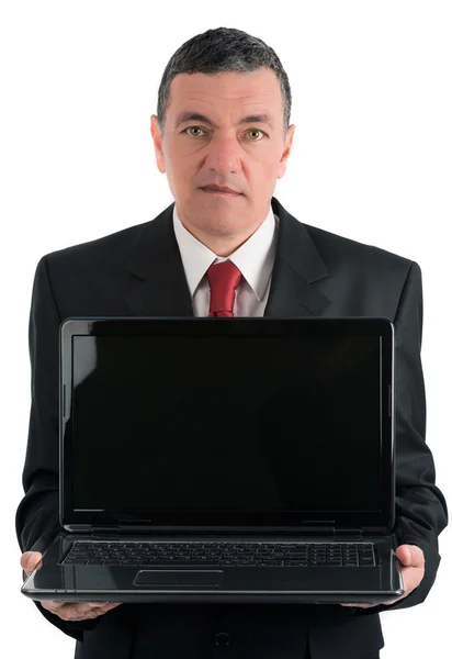 Older businessman with a laptop isolated on white background — Stock Photo, Image