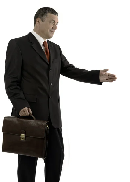 Older businessman with briefcase isolated on white background — Stock Photo, Image