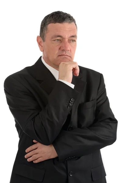 Elderly businessman is thinking about something isolated on whit — Stock Photo, Image