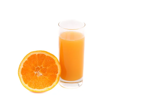 An orange and a glass of juice — Stock Photo, Image
