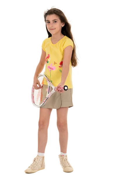 Petite fille avec des jeux de tennis sur un fond blanc — Photo