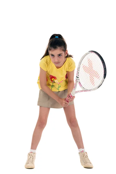 Petite fille avec des jeux de tennis sur un fond blanc — Photo