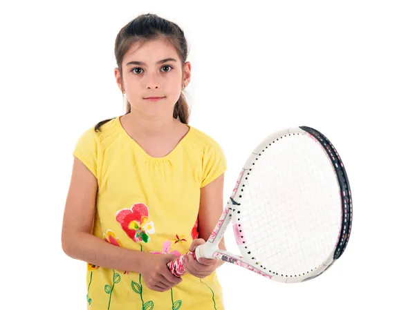 Petite fille avec des jeux de tennis sur un fond blanc — Photo