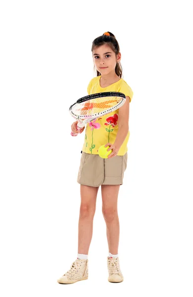 Petite fille avec des jeux de tennis sur un fond blanc — Photo