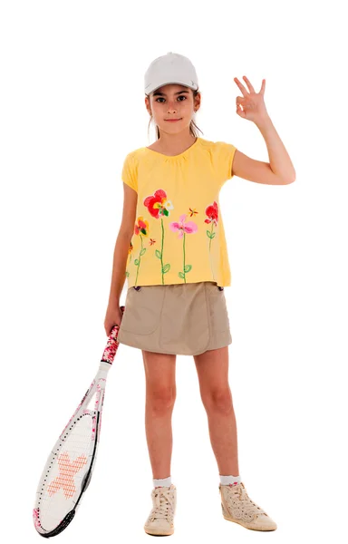 Little girl with a tennis racket gesture shows okay on white bac — Stock Photo, Image
