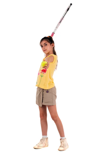 Petite fille avec des jeux de tennis sur un fond blanc — Photo