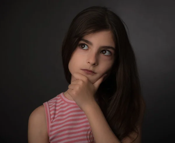 Teen posing and improvising over black backdrop — Stock Photo, Image