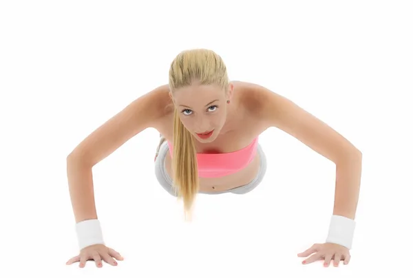 Mujer fuerte haciendo push-up —  Fotos de Stock