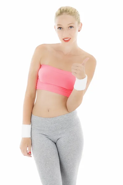 Young attractive, beautiful fitness woman smile holding thump up — Stock Photo, Image