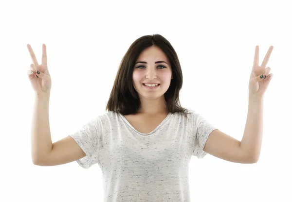Spokojený úsměv, krásná mladá žena zobrazeno dvěma prsty nebo victo — Stock fotografie