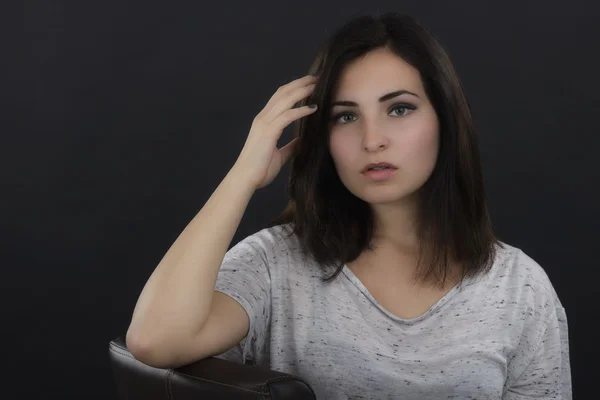 Portrait of beautiful woman isolated on black — Stock Photo, Image