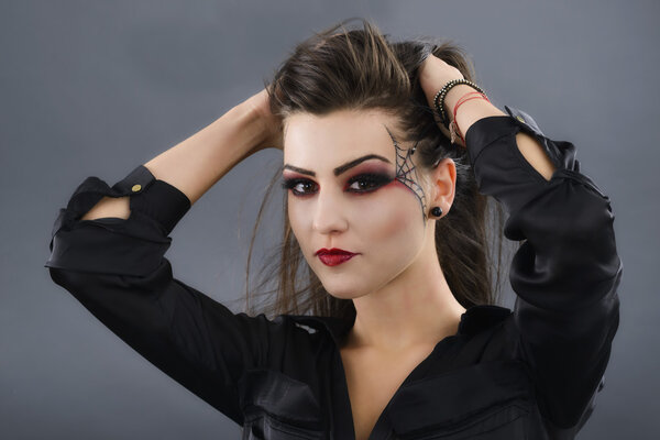 Beauty portrait of young glamour beautiful halloween woman