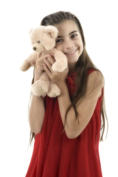 Portrait of an adorable toddler girl hugging a teddy bear — Stock Photo, Image