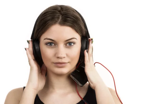 Woman with headphones listening music .Music teenager girl danci — Stock Photo, Image