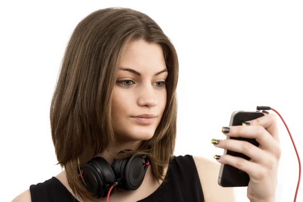 Woman with headphones listening music .Music teenager girl danci — Stock Photo, Image