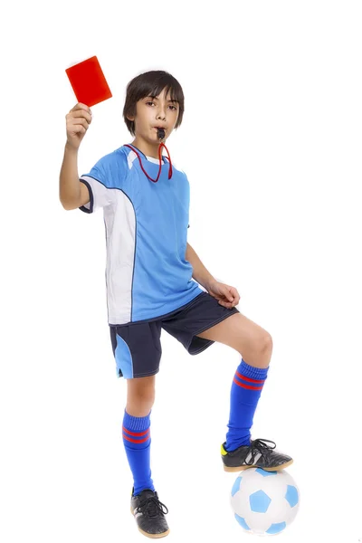 Dziecko w sportowej posiadania piłki nożnej i dając czerwona kartka isolat — Zdjęcie stockowe