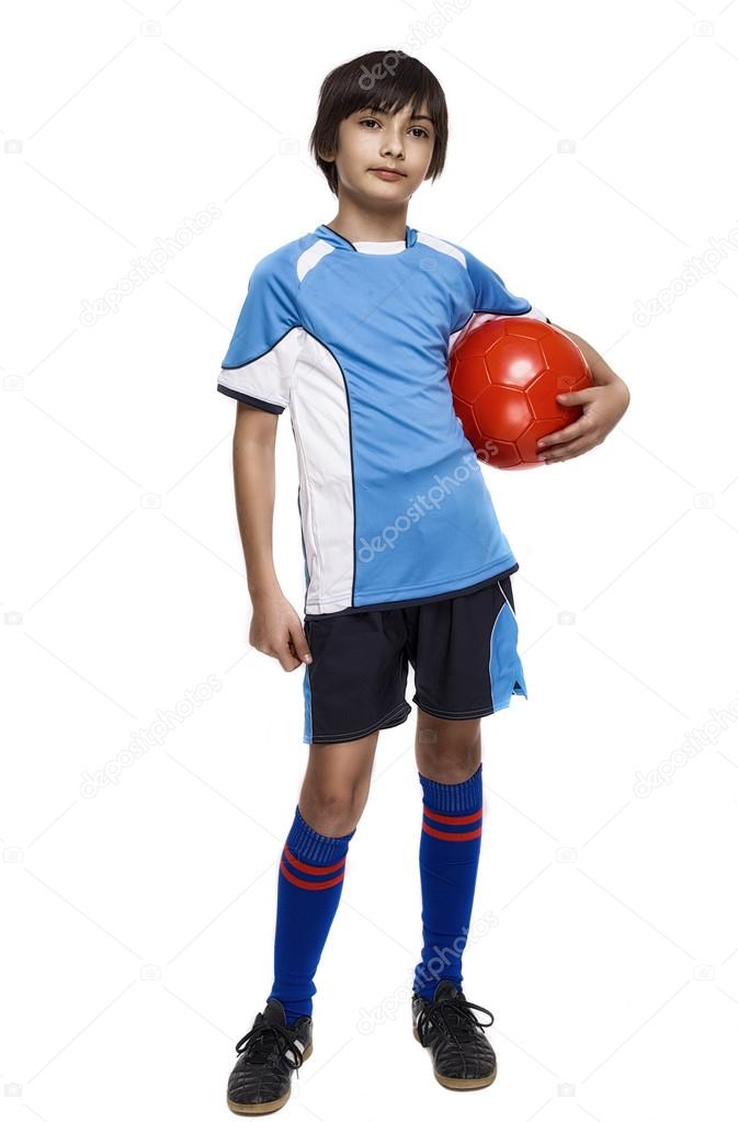 Boy in sport wear with football isolated on white background