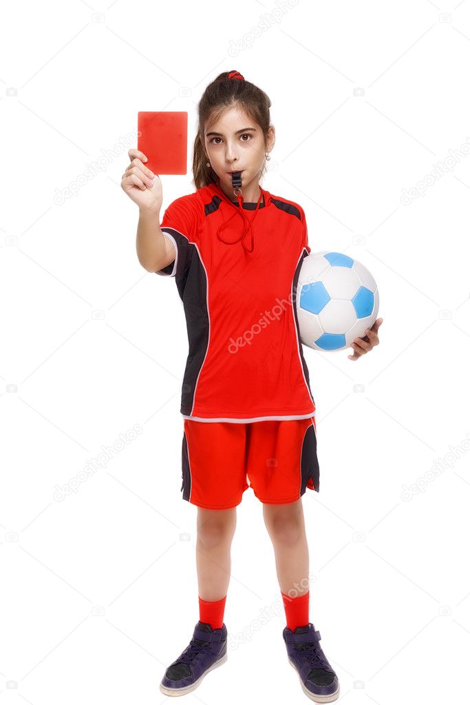 Kid in sportswear holding soccer ball and giving red card isolat