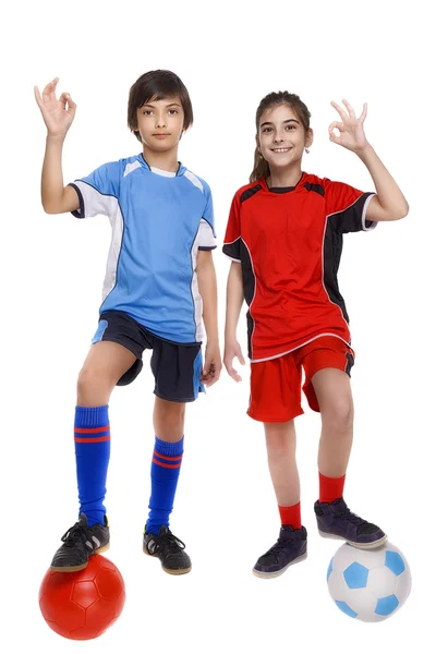Gösterilen iki çocuk futbol oyuncu ok işareti — Stok fotoğraf